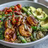 Rainbow Vegetable Detox Bowl topped with roasted vegetables, juicy shrimp, and tangy balsamic drizzle, ready to enjoy for lunch.