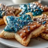 Dazzling Gemini Zodiac Cookies crowned with shimmering star royal icing for a party.