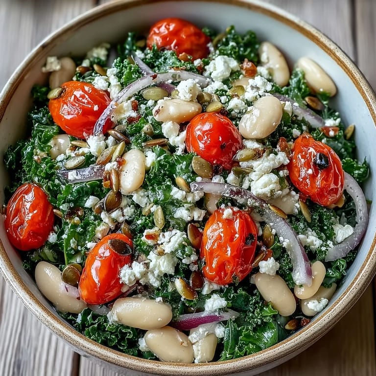 A close-up of the White Bean and Kale Salad, showcasing tender kale, creamy white beans, and a zesty lemon-garlic dressing.